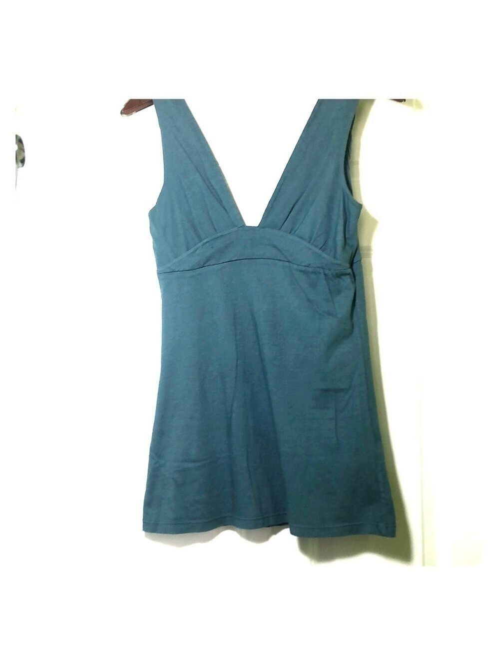 🆕 A Blue Green brand new top with twist straps.